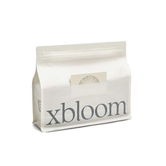 White packaging with 'xbloom' branding on a white background
