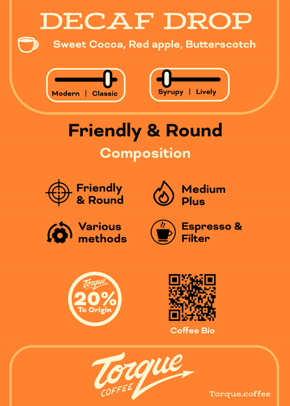 Torque Coffee Decaf Drop label with flavor description, composition details, and branding elements on an orange background.